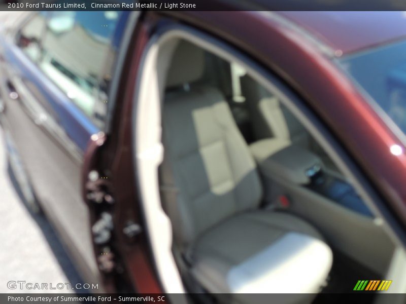 Cinnamon Red Metallic / Light Stone 2010 Ford Taurus Limited