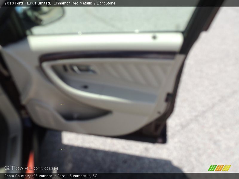 Cinnamon Red Metallic / Light Stone 2010 Ford Taurus Limited
