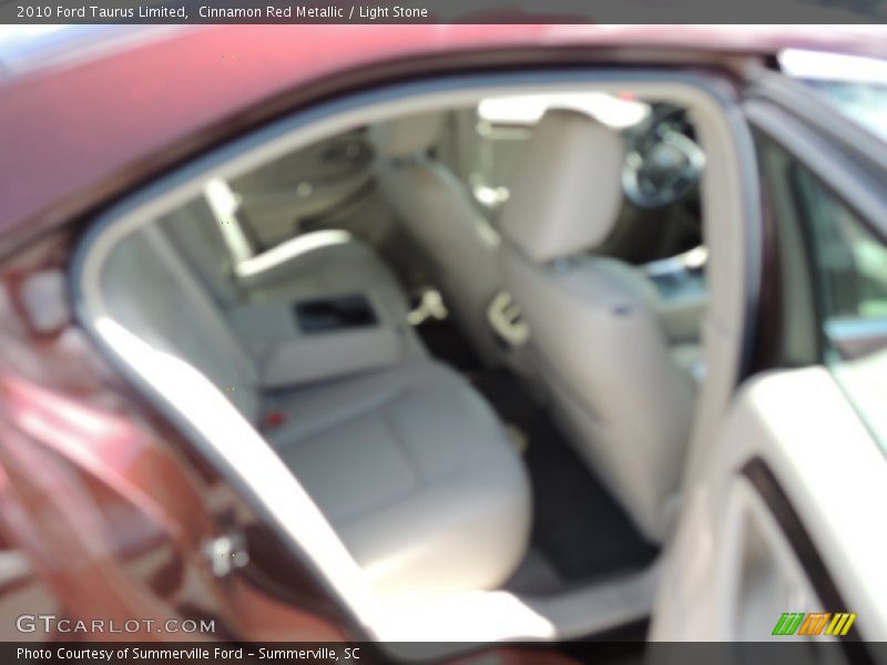 Cinnamon Red Metallic / Light Stone 2010 Ford Taurus Limited