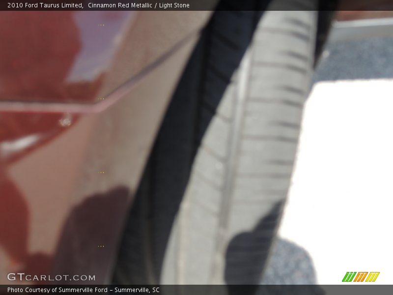 Cinnamon Red Metallic / Light Stone 2010 Ford Taurus Limited