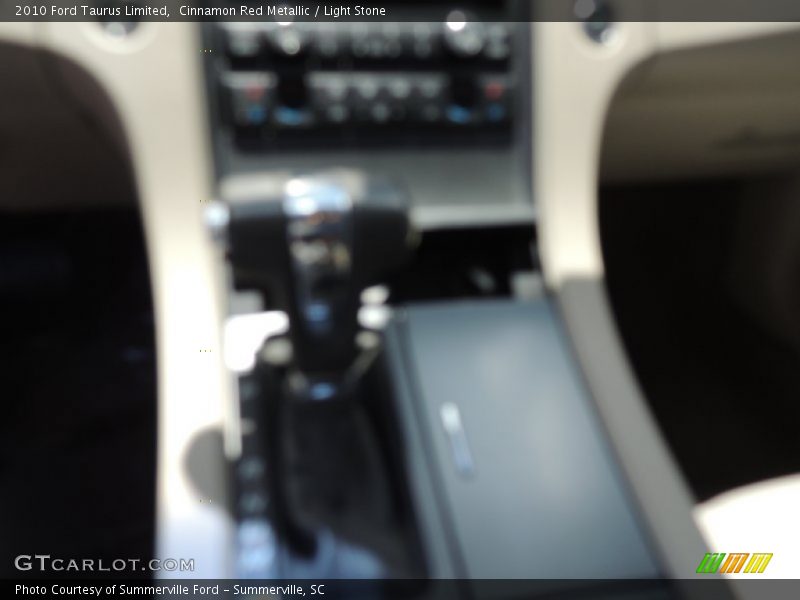 Cinnamon Red Metallic / Light Stone 2010 Ford Taurus Limited