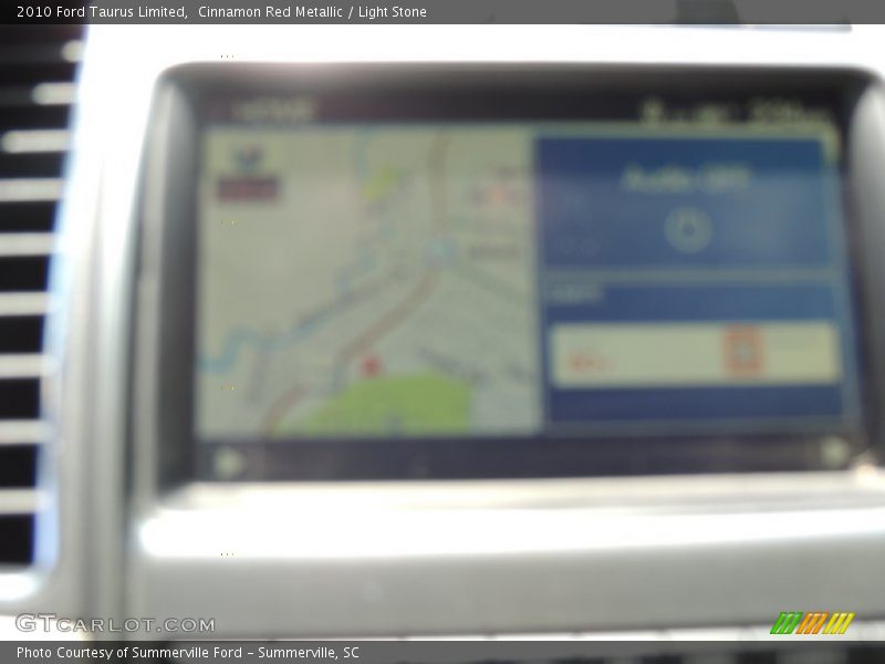 Cinnamon Red Metallic / Light Stone 2010 Ford Taurus Limited