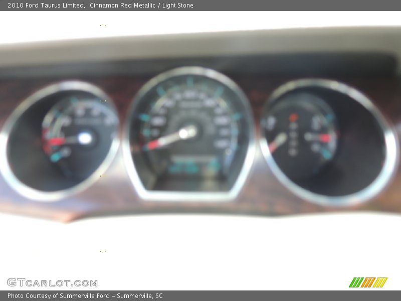 Cinnamon Red Metallic / Light Stone 2010 Ford Taurus Limited