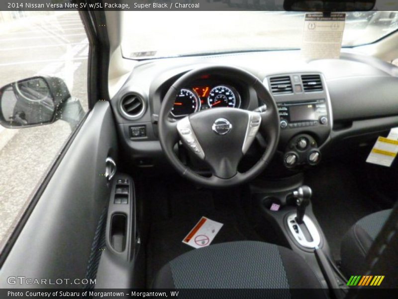 Dashboard of 2014 Versa Note SV w/SL Package