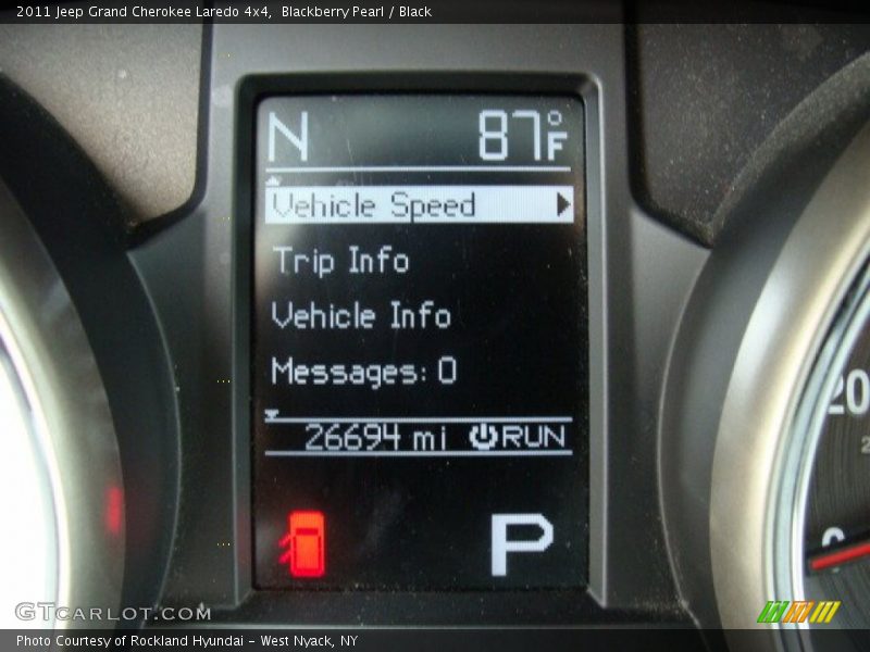 Blackberry Pearl / Black 2011 Jeep Grand Cherokee Laredo 4x4