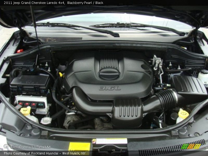 Blackberry Pearl / Black 2011 Jeep Grand Cherokee Laredo 4x4