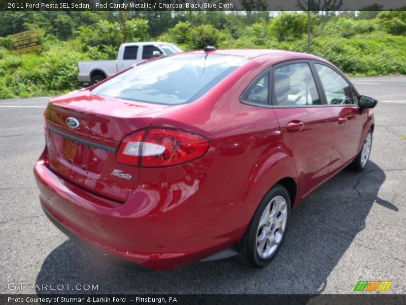 Red Candy Metallic / Charcoal Black/Blue Cloth 2011 Ford Fiesta SEL Sedan