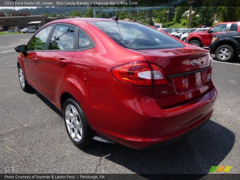 Red Candy Metallic / Charcoal Black/Blue Cloth 2011 Ford Fiesta SEL Sedan