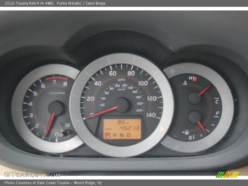 Pyrite Metallic / Sand Beige 2010 Toyota RAV4 I4 4WD