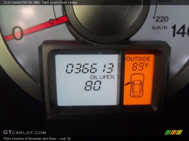 Dark Cherry Pearl / Beige 2010 Honda Pilot EX 4WD