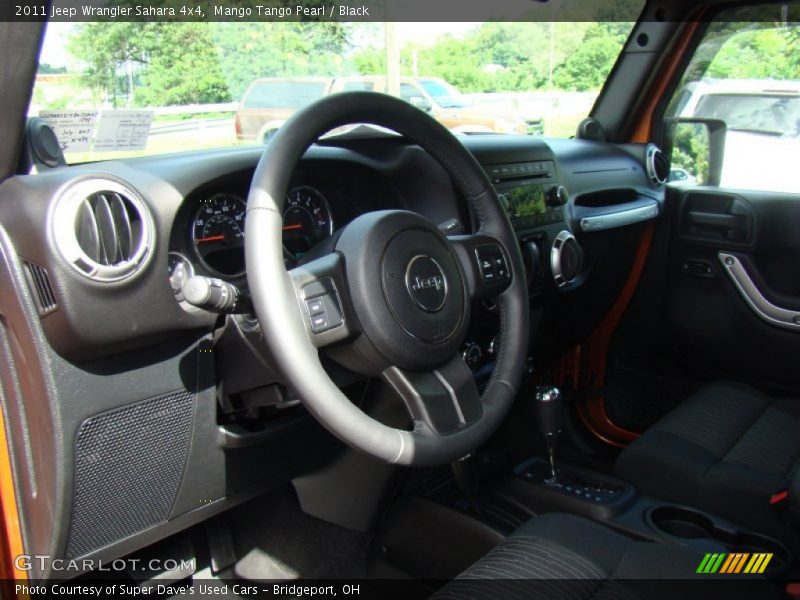 Mango Tango Pearl / Black 2011 Jeep Wrangler Sahara 4x4