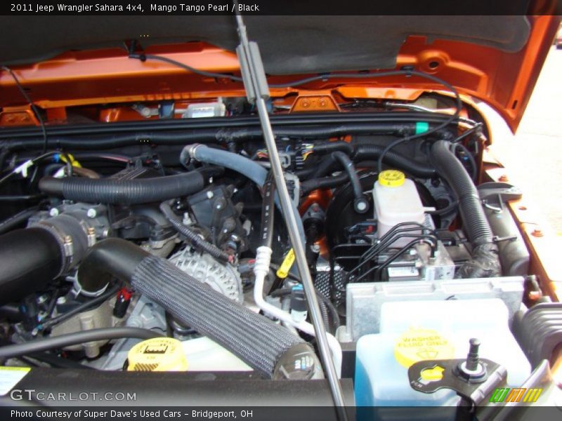 Mango Tango Pearl / Black 2011 Jeep Wrangler Sahara 4x4