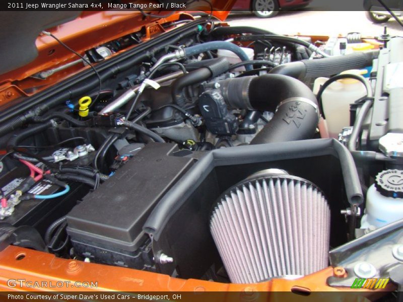Mango Tango Pearl / Black 2011 Jeep Wrangler Sahara 4x4