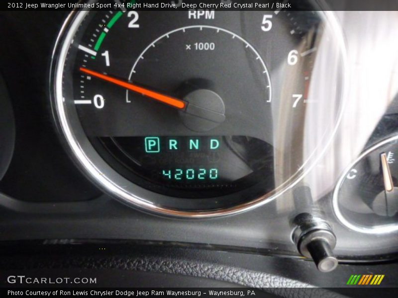 Deep Cherry Red Crystal Pearl / Black 2012 Jeep Wrangler Unlimited Sport 4x4 Right Hand Drive
