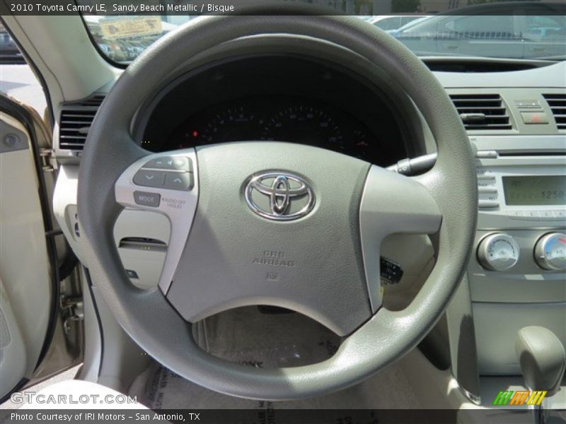 Sandy Beach Metallic / Bisque 2010 Toyota Camry LE