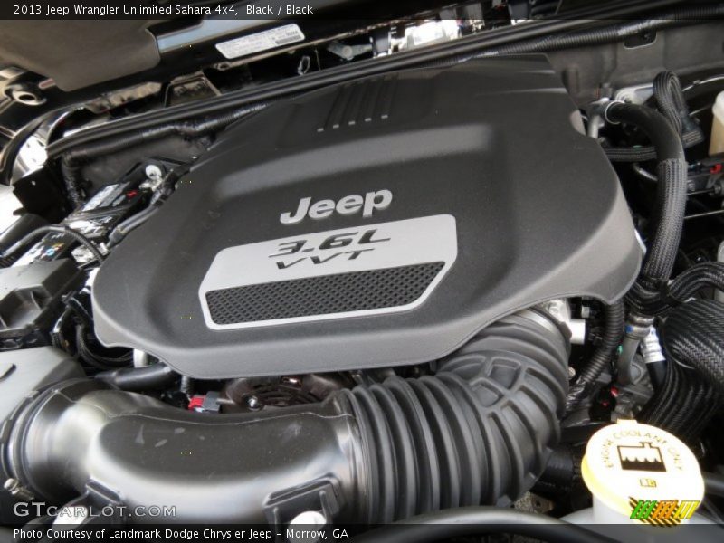 Black / Black 2013 Jeep Wrangler Unlimited Sahara 4x4