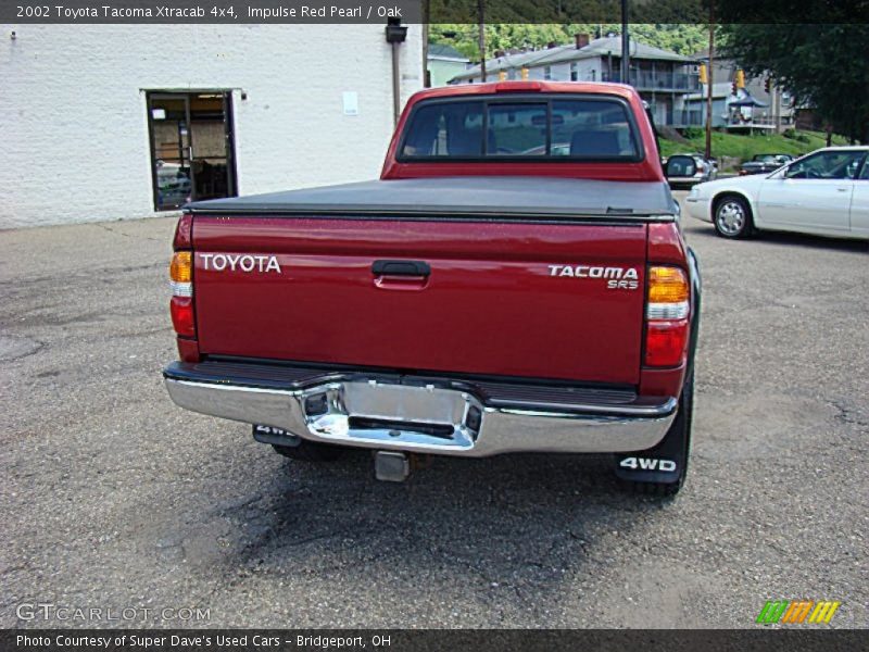 Impulse Red Pearl / Oak 2002 Toyota Tacoma Xtracab 4x4