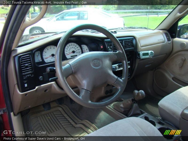Impulse Red Pearl / Oak 2002 Toyota Tacoma Xtracab 4x4