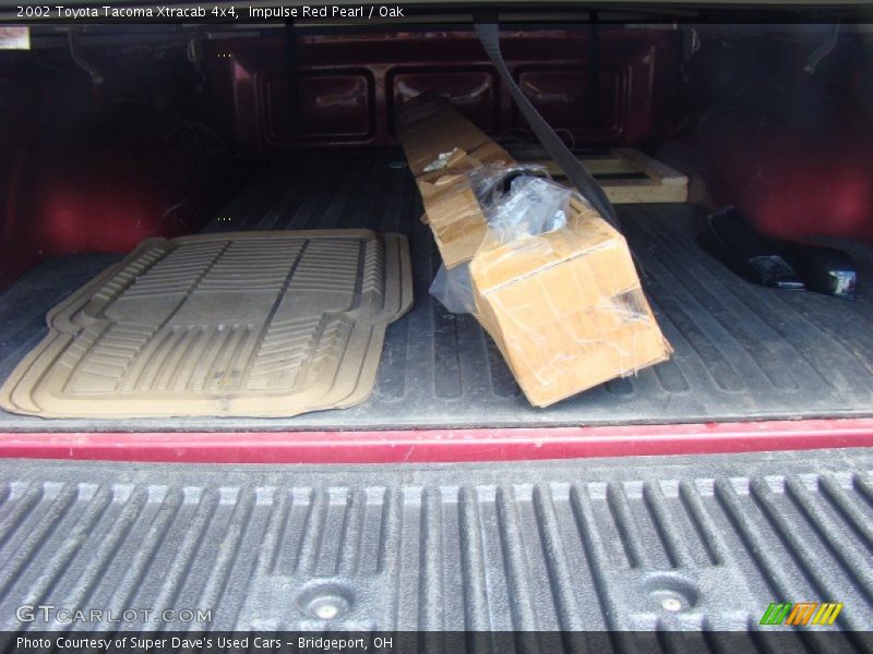 Impulse Red Pearl / Oak 2002 Toyota Tacoma Xtracab 4x4