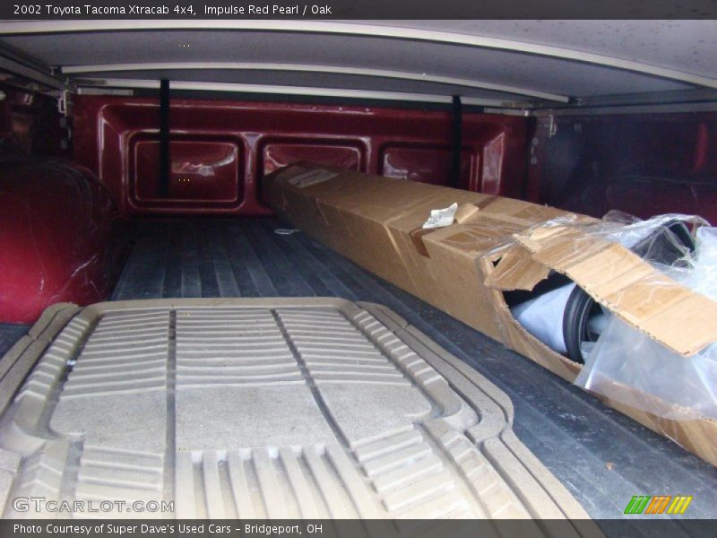 Impulse Red Pearl / Oak 2002 Toyota Tacoma Xtracab 4x4