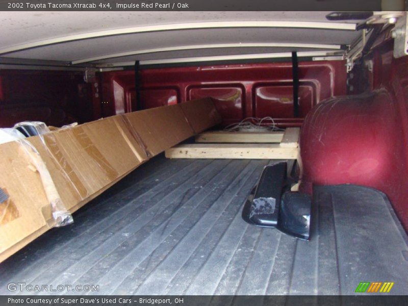 Impulse Red Pearl / Oak 2002 Toyota Tacoma Xtracab 4x4