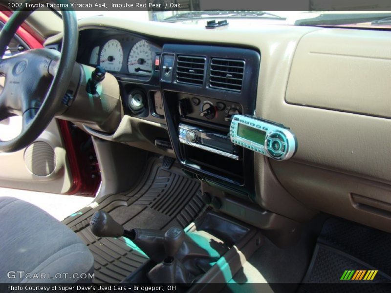Impulse Red Pearl / Oak 2002 Toyota Tacoma Xtracab 4x4