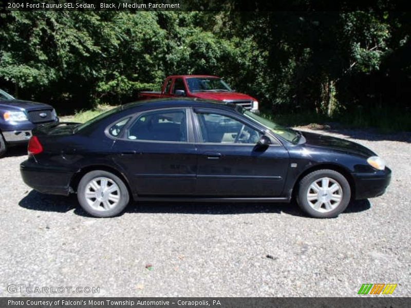 Black / Medium Parchment 2004 Ford Taurus SEL Sedan