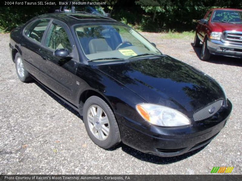 Black / Medium Parchment 2004 Ford Taurus SEL Sedan