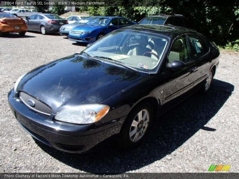 Black / Medium Parchment 2004 Ford Taurus SEL Sedan