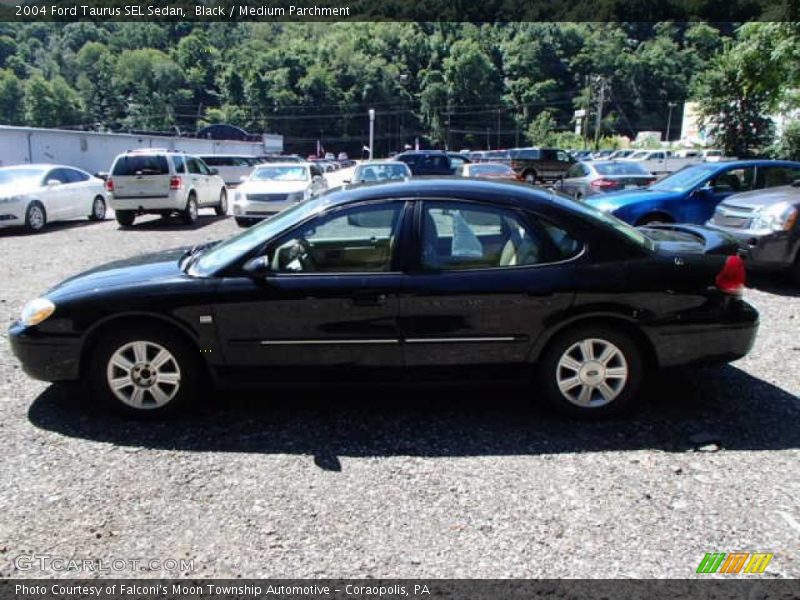 Black / Medium Parchment 2004 Ford Taurus SEL Sedan