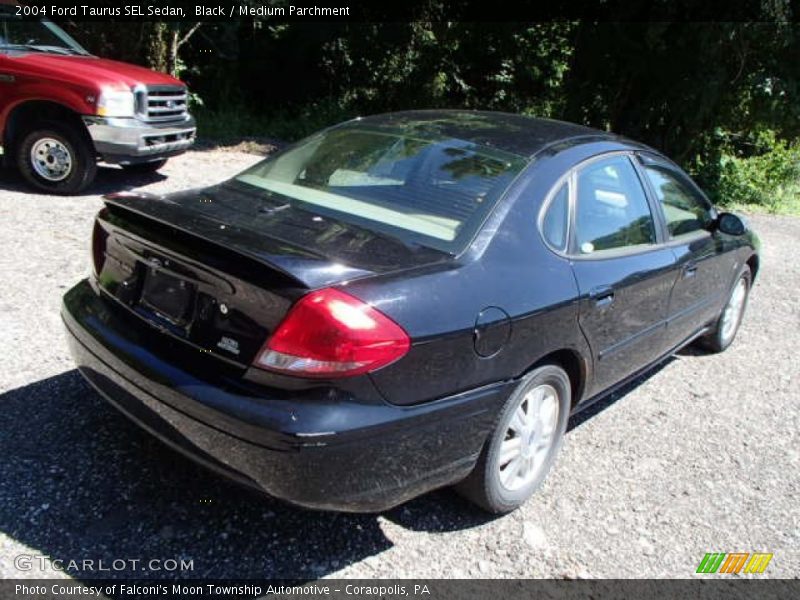 Black / Medium Parchment 2004 Ford Taurus SEL Sedan