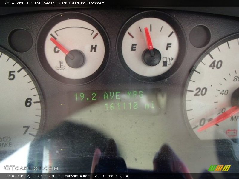 Black / Medium Parchment 2004 Ford Taurus SEL Sedan