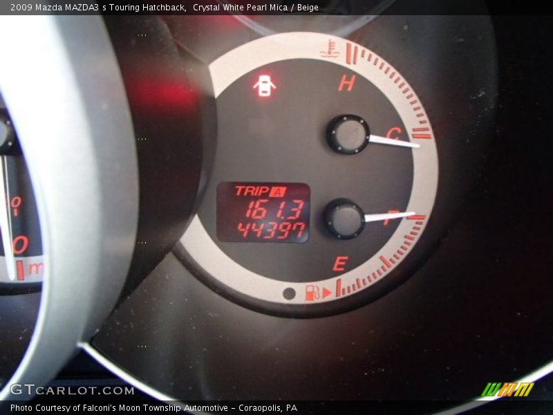 Crystal White Pearl Mica / Beige 2009 Mazda MAZDA3 s Touring Hatchback