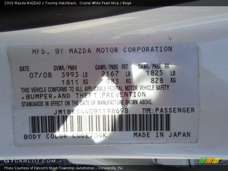 Crystal White Pearl Mica / Beige 2009 Mazda MAZDA3 s Touring Hatchback