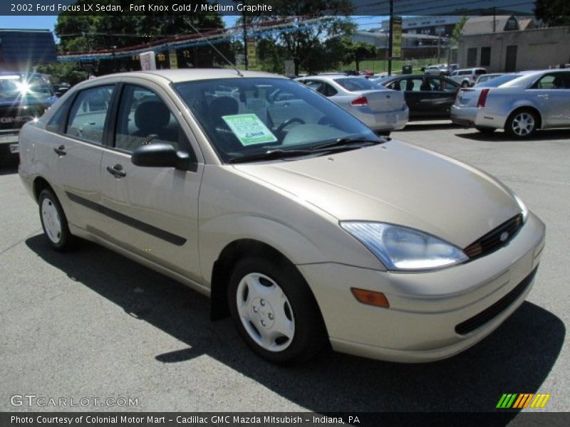 Fort Knox Gold / Medium Graphite 2002 Ford Focus LX Sedan