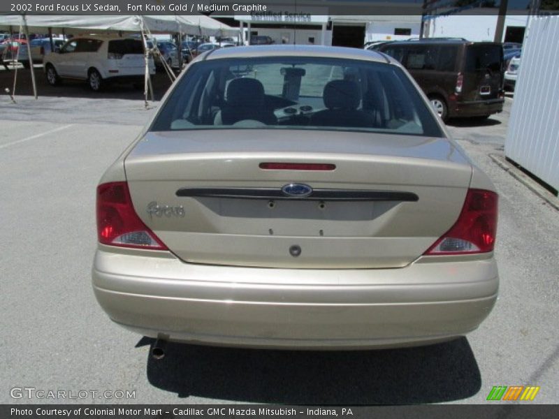 Fort Knox Gold / Medium Graphite 2002 Ford Focus LX Sedan