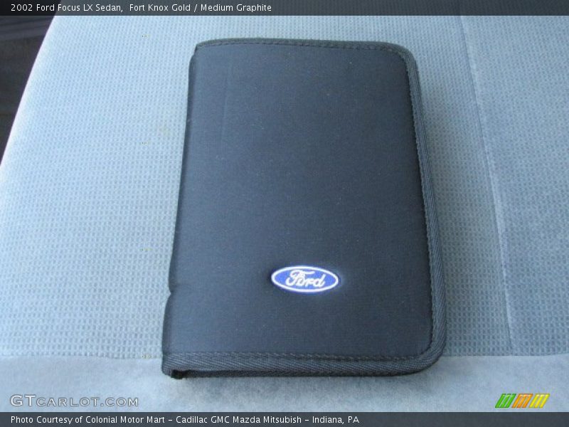 Fort Knox Gold / Medium Graphite 2002 Ford Focus LX Sedan