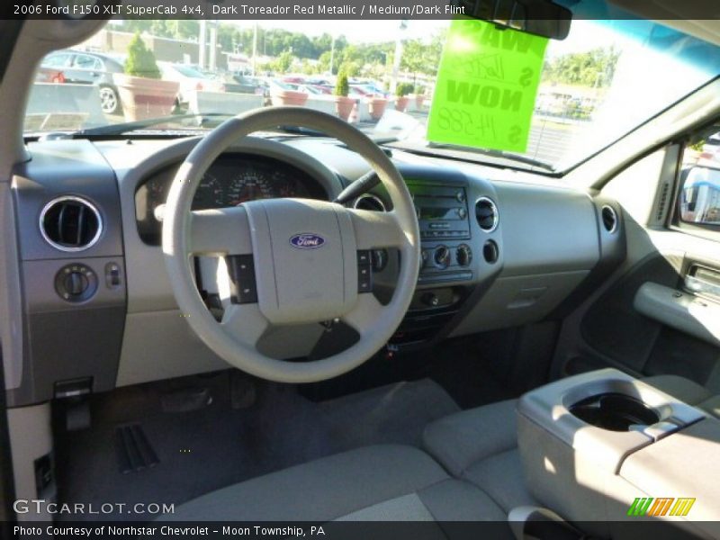 Dark Toreador Red Metallic / Medium/Dark Flint 2006 Ford F150 XLT SuperCab 4x4