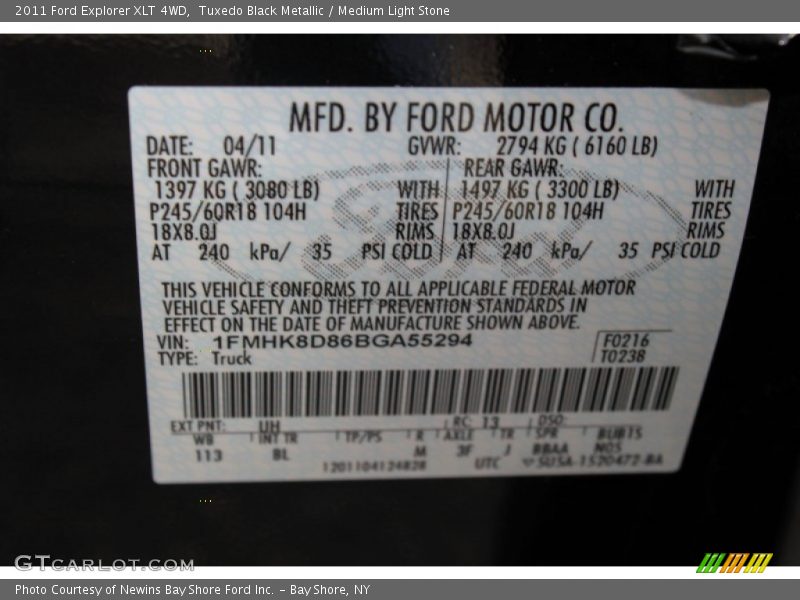 Tuxedo Black Metallic / Medium Light Stone 2011 Ford Explorer XLT 4WD