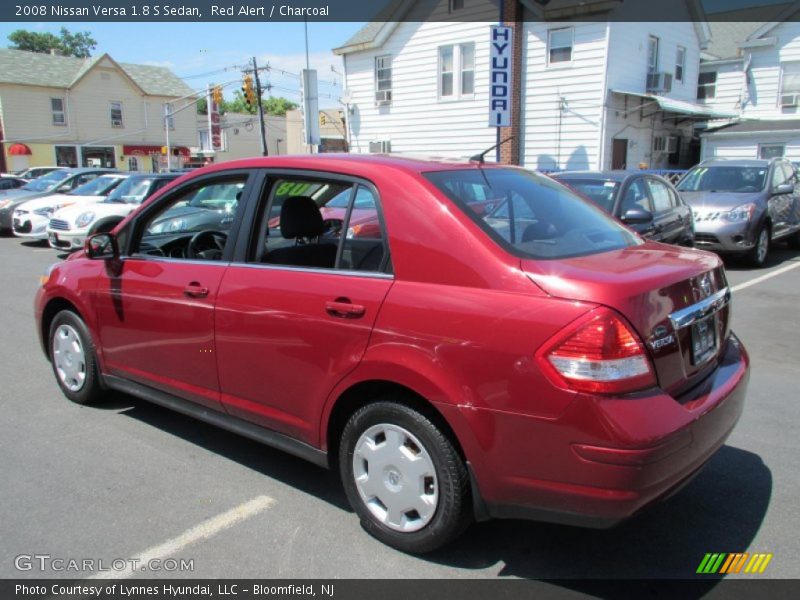Red Alert / Charcoal 2008 Nissan Versa 1.8 S Sedan