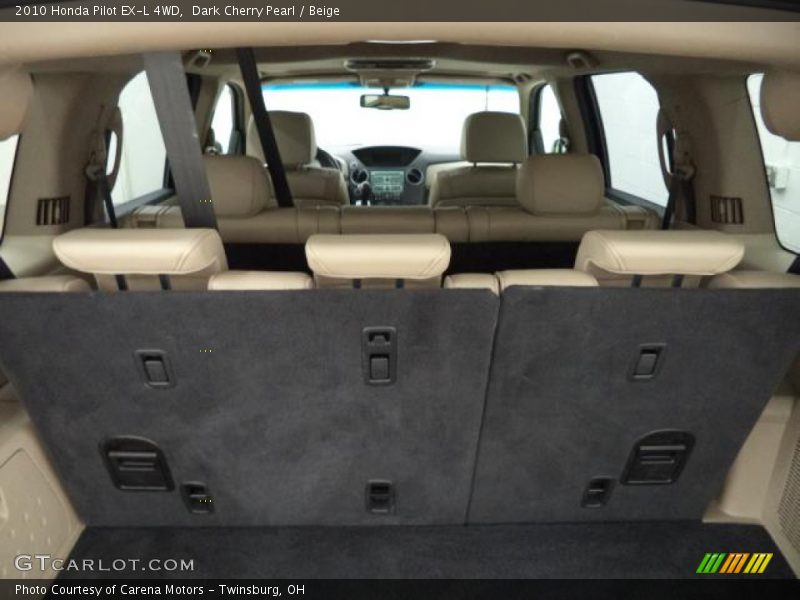 Dark Cherry Pearl / Beige 2010 Honda Pilot EX-L 4WD
