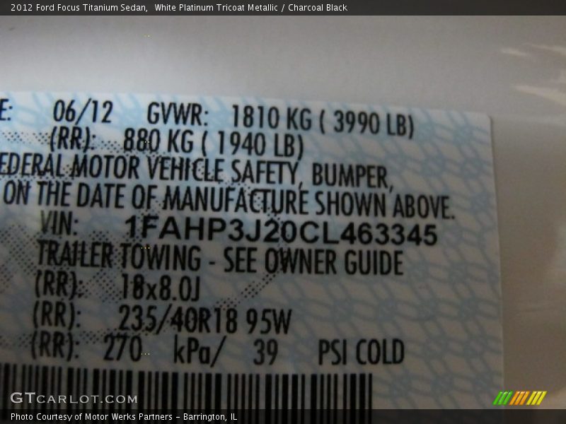 White Platinum Tricoat Metallic / Charcoal Black 2012 Ford Focus Titanium Sedan