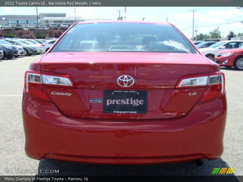 Barcelona Red Metallic / Ivory 2012 Toyota Camry LE