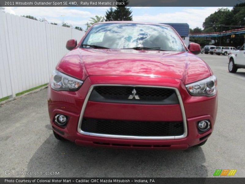 Rally Red Metallic / Black 2011 Mitsubishi Outlander Sport SE 4WD