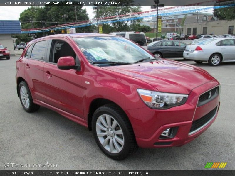 Rally Red Metallic / Black 2011 Mitsubishi Outlander Sport SE 4WD