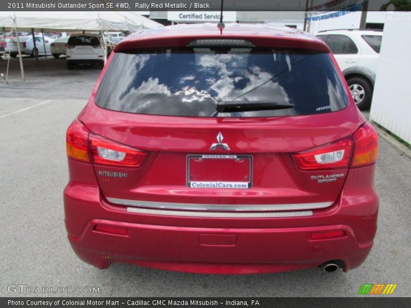 Rally Red Metallic / Black 2011 Mitsubishi Outlander Sport SE 4WD