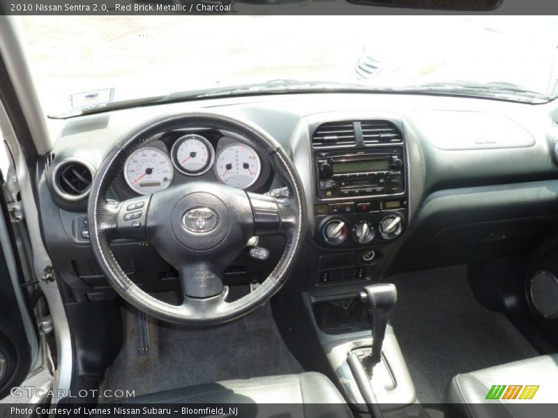 Red Brick Metallic / Charcoal 2010 Nissan Sentra 2.0