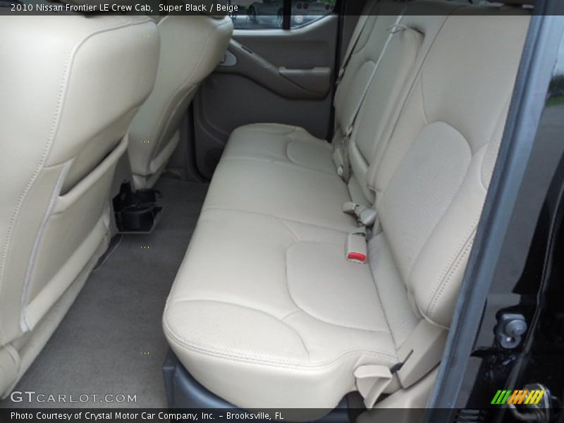 Super Black / Beige 2010 Nissan Frontier LE Crew Cab