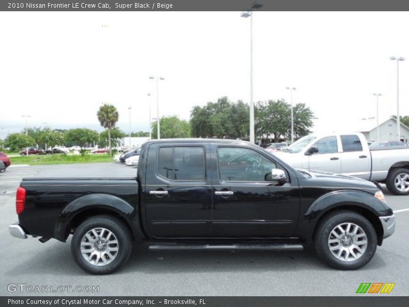 Super Black / Beige 2010 Nissan Frontier LE Crew Cab