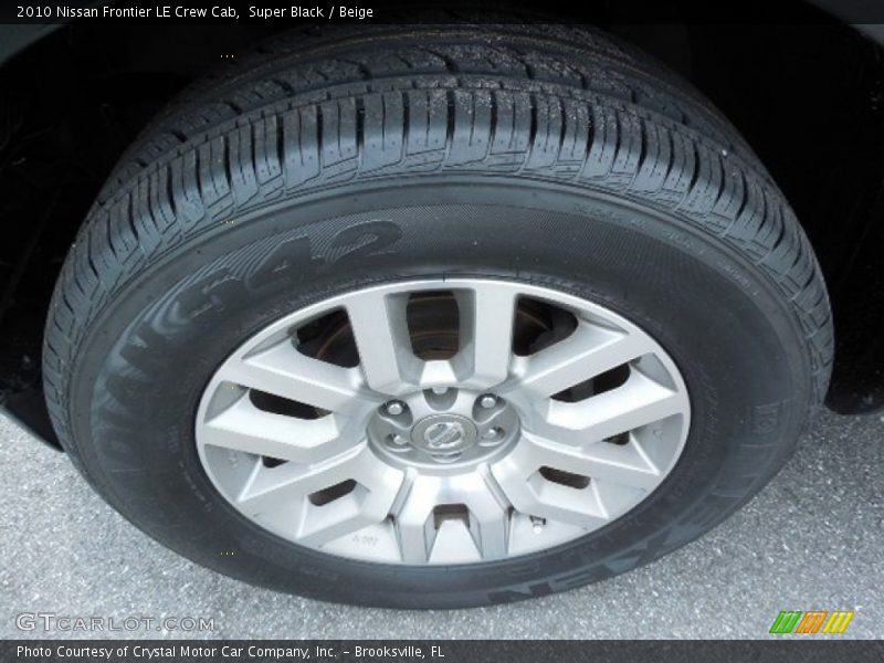 Super Black / Beige 2010 Nissan Frontier LE Crew Cab